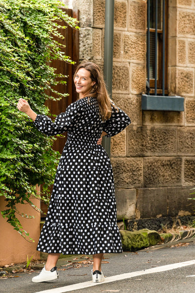 Gorgeous trans-seasonal dress from Boho Australia   We love a little polka dot especially black and white   Featuring a flattering V-Neckline   Smocked elasticated waist   Long sleeves   Maxi length   Inseam pockets   Cotton fabrication 